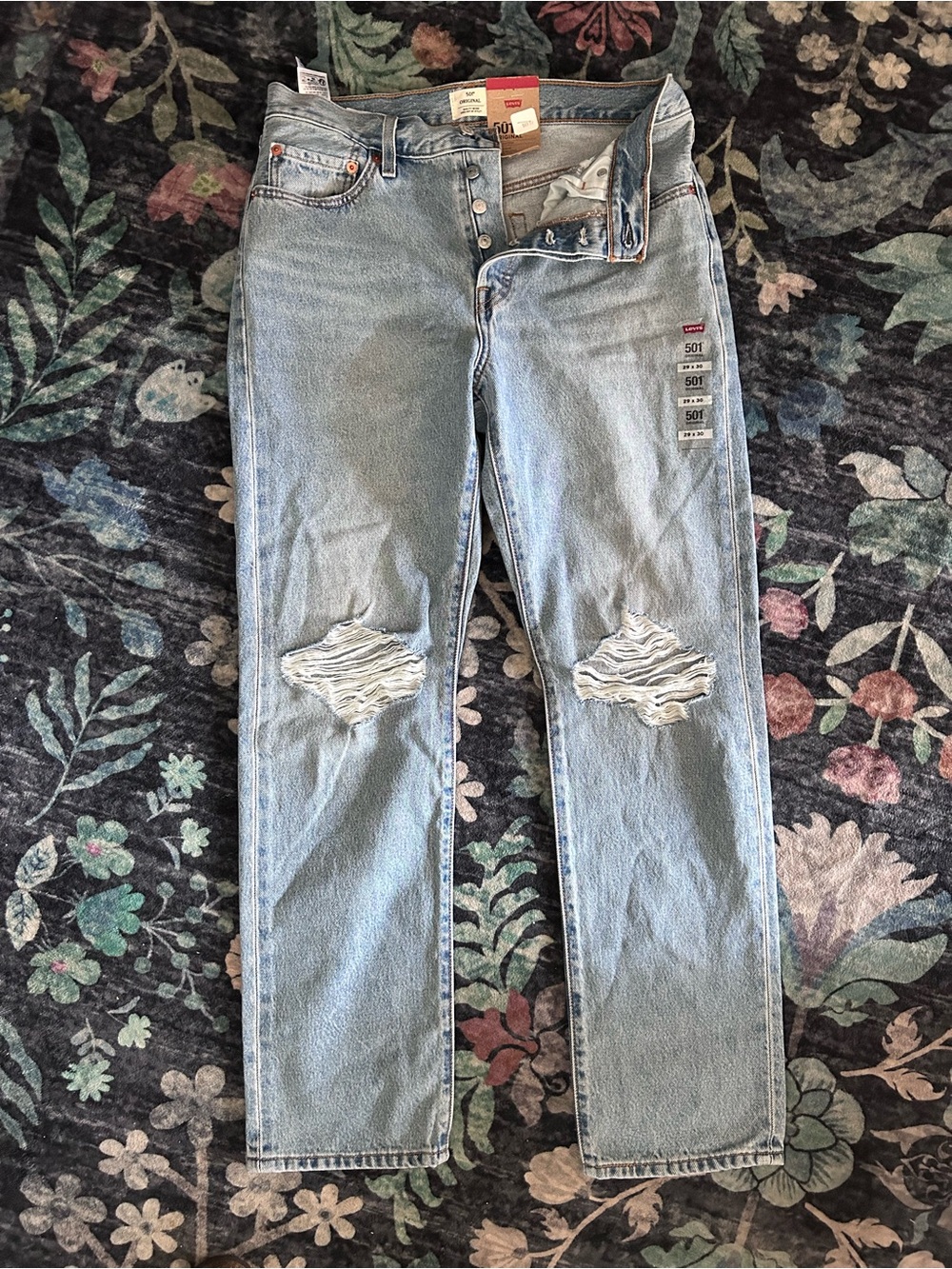 Levi's light blue denim 501 straight leg button-fly jeans